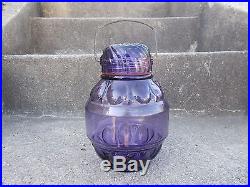 1890 ORIGINAL AMETHYST GLASS FANCY CANDY JAR WithSUN PATTERN LID & STEEL HANDLE