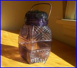 1890s AMETHYST SUN & MOON PATTERN CANDY JAR ORIGINAL GLASS LID & CARRYING HANDLE