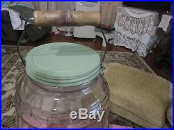 Large antique glass general store wood handle pickle jar 15 inch tall