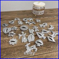 Pyrex The Cracker Barrel Canister Jar Filled with Aluminum/Metal Cookie Cutters