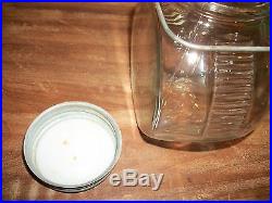 Small Owens-Illinois glass canister jar with metal handle Ball lid ribbed sides