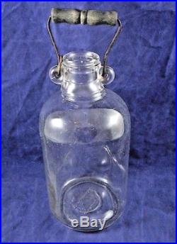 VINTAGE GLASS JUG JAR with WIRE WOODEN BAIL HANDLE 1926 ILLINOIS GLASS CO