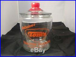 VINTAGE TOM'S TOASTED PEANUTS 5c GLASS JAR withGLASS LID RED EMBOSSED TOMs HANDLE