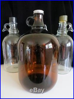 VTG CLEAR GLASS 3/4GALLON JUG/BOTTLE WITH LID AND RINGFINGER HANDLE -3 AVAILABLE
