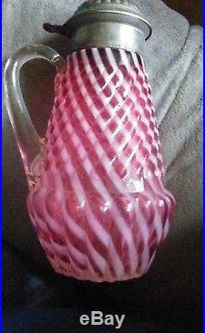 Vintage Fenton Cranberry Opalescent Swirl Syrup Jar with applied handle & tin lid