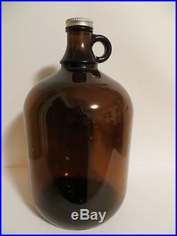 Vintage One Gallon Brown/Amber Glass Handled Jug With Lid # B0665- 11-3/4Tall
